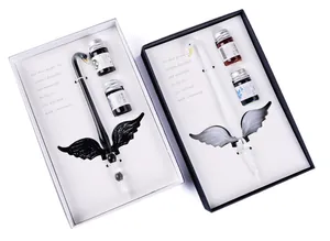 Two elegant sets of handmade swan glass dip pens with ink bottles in gift boxes