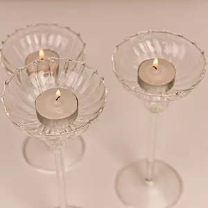 Elegant ribbed glass goblet candle holders with tea lights for romantic dinner decor