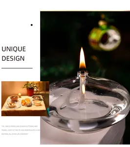 Detailed macro view of a high borosilicate glass oil lamp with a bright flickering flame