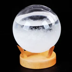 Élégante bouteille prévision météo en verre tempête sphérique avec socle en bois