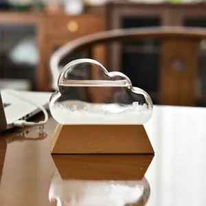Creative cloud-shaped storm glass weather forecast bottle on a minimalist wooden base