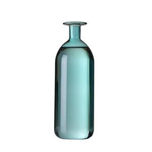 Minimalist cylindrical blue-green glass vase for hydroponic plants and home decor