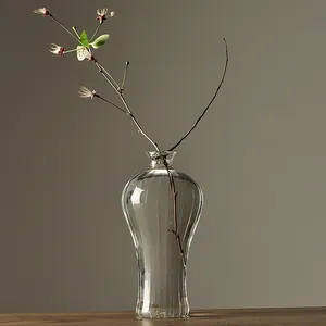Minimalist Japanese style transparent glass vase with vertical ribbing and narrow neck