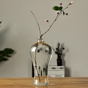 Japanese style ribbed transparent glass vase for Zen home decor with a dry branch