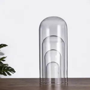 Set of four nested transparent glass cloche domes for preserved flowers and DIY dioramas