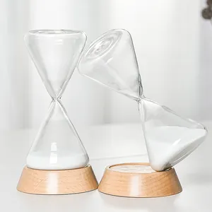 Elegant minimalist glass hourglass timer with wood base and white sand desktop ornament