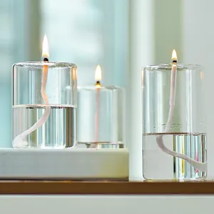 Elegant set of three transparent glass oil lamp candle holders for cozy home decor