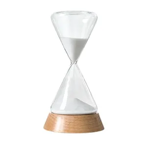 15-minute glass hourglass sand timer with elegant wooden base and fine white sand