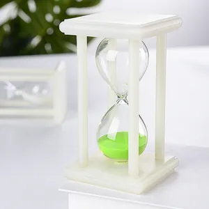 Minimalist creative luminous sand hourglass timer with green sand and white frame