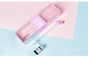 Detailed view of creative flamingo glass dip pen gift set with pink box and blue ink
