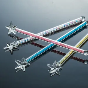 Handmade star-shaped glass stirring rods filled with colorful sparkling crystal stones