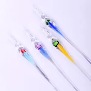 Elegant handcrafted glass jellyfish dip pens set in four vibrant colors on white background