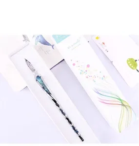 Elegant starry sky glass dipping pen showcased in its artistic white gift packaging box