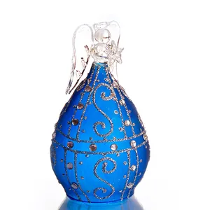 Elegant blue glass angel figurine with silver glitter and rhinestone accents for gift