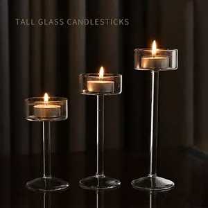 Elegant set of three hand-blown tall glass candlesticks for romantic dinner decor