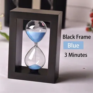 Modern decorative 3-minute sand timer with blue sand in a minimalist black frame