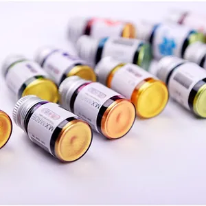 Premium set of shimmering dip pen ink bottles with gold powder for glass calligraphy pens