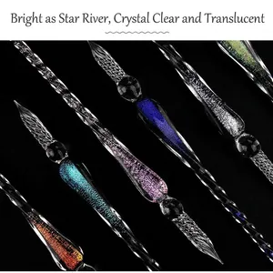Elegant handmade glass dip pen set with glittery starry sky design for calligraphy art