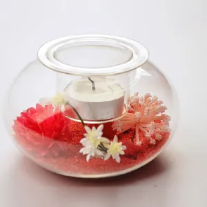 Elegant creative glass landscape candle holder with red sand and artificial flowers
