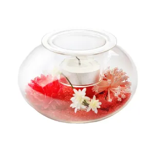 Modern creative transparent glass candle holder featuring red decorative sand and flowers