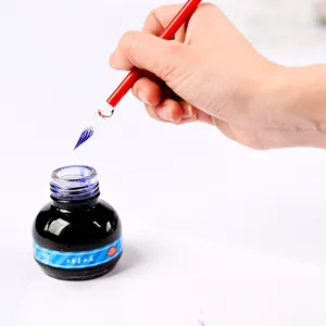 Handmade red glass dip pen set with spiral nib and blue ink bottle for calligraphy