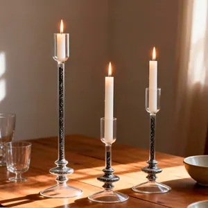 Elegant European glass candlestick set with black glitter quicksand for home decor.