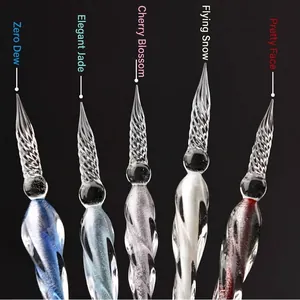 Set of five elegant glass dip pens with spiral nibs and colorful ink reservoirs