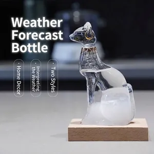 Elegant Egyptian cat shaped storm glass weather predictor with a natural wooden base
