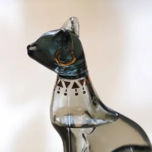 Vintage Egyptian cat storm glass weather forecast bottle with elegant gold tracing