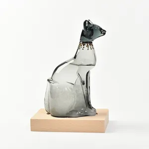 Vintage Egyptian cat shaped glass storm bottle weather predictor on minimalist wooden base