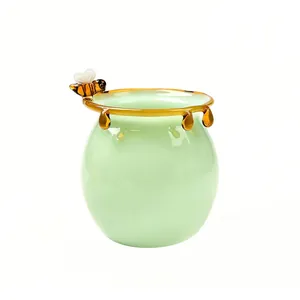Taza tarro de miel de vidrio verde estilo Ins con decoración de abeja para postre
