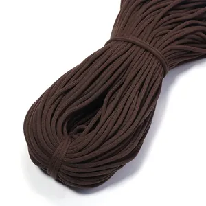 Brown elastic cord detail view, stretchy band for DIY crafts, clothing, and hair ties.