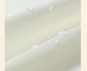 Macro detail of waterproof EVA fabric with water droplets on textured surface