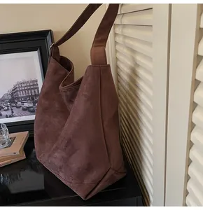 Brown suede large capacity shoulder tote bag, casual lazy style underarm handbag for daily commute.