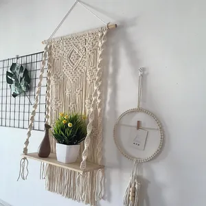Bohemian macrame wall hanging with wooden shelf, handmade cotton woven home decor.