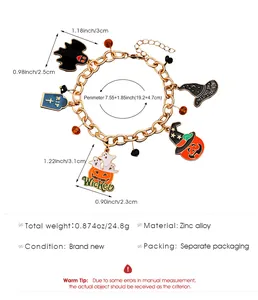 Halloween themed charm bracelet with bat and pumpkin pendants including size measurements