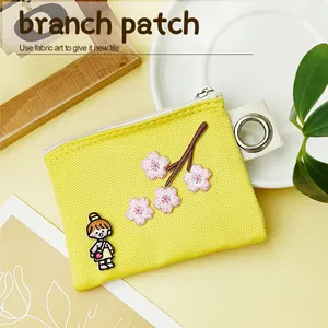 Yellow canvas coin purse with cute cherry blossom embroidery and cartoon patch zipper bag.