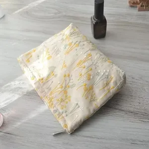 Vintage embroidered floral cosmetic bag, portable makeup pouch for women and girls daily travel use.