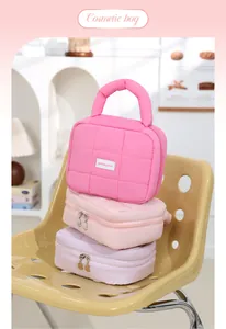 Candy color quilted cosmetic bag, soft portable toiletry storage pouch with handle for women.