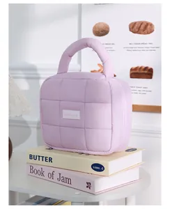 Light purple quilted puffer makeup bag, large capacity portable cosmetic pouch for travel daily use.