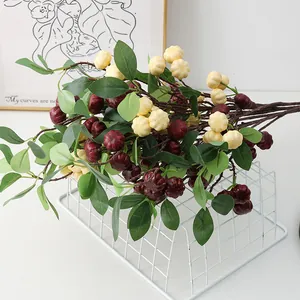 Artificial simulation pumpkin branch decor for Halloween holiday home party layout.