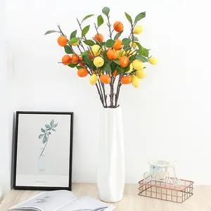 Artificial lemon fruit branches for home decor, long stem fake floral arrangement vase filler.