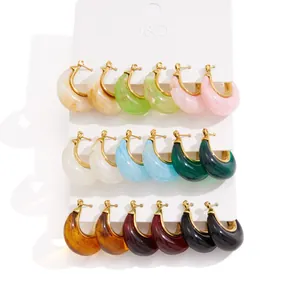 Set of colorful C-shaped resin hoop earrings with stainless steel posts in various marbled tones