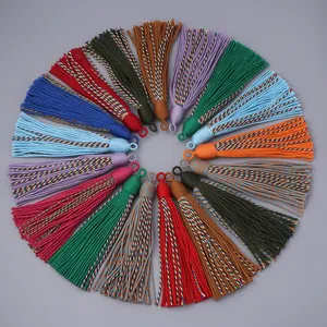 Colorful decorative tassel pendants, multi-color hanging cords for home decor crafts.