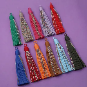 Colorful fabric decorative tassels pendant detail shot, ideal for curtains and crafts decor.