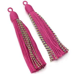 Nordic style decorative pink tassels with colorful stripes, perfect for home curtain and pendant decor.