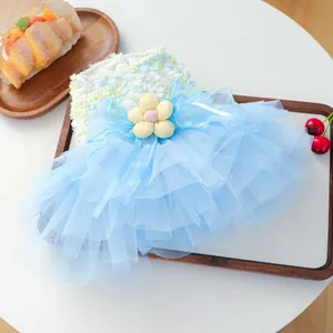 Cute pet dog mesh tutu dress for small puppies, multi-layer blue fairy skirt with floral decor.
