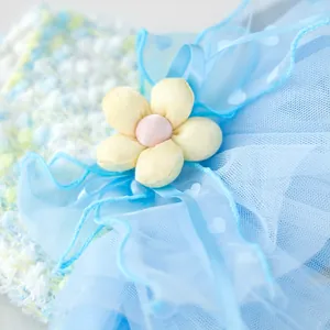 Close-up detail of blue pet tutu dress featuring multi-layer mesh tulle and lovely flower.
