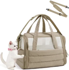 Soft-sided pet carrier bag for cats and dogs, quilted foldable travel tote with strap.