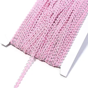 Pink silver metallic wave braid trim detail close up, ric rac ribbon for sewing craft DIY.